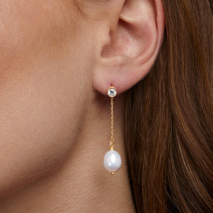 Close detail of the Gold Pearl Drop Wedding Earrings in 18K Gold Vermeil with Freshwater Pearl. Tarnish-resistant, premium.