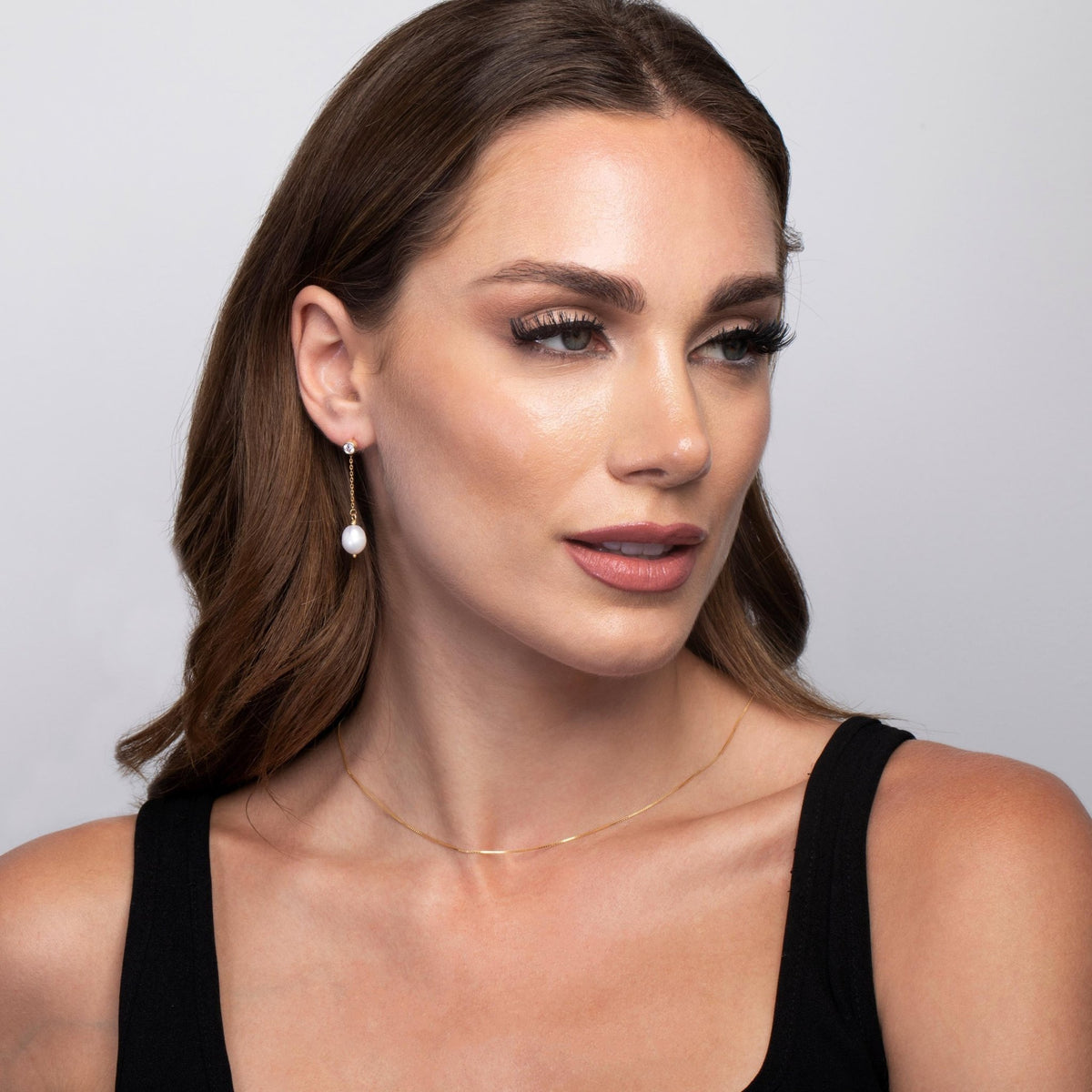 The Gold Pearl Drop Wedding Earrings styled in 18K Gold Vermeil — elegant everyday jewelry. Hypoallergenic for sensitive.