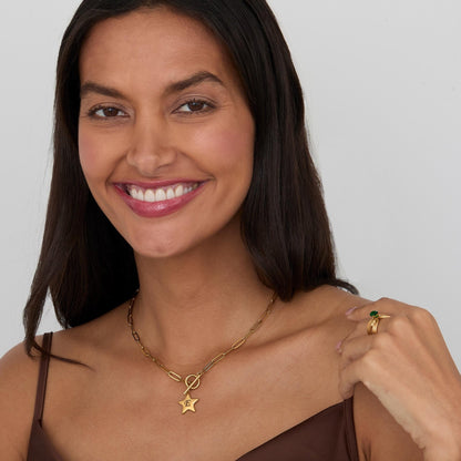 Gold Star Necklace with Personalized Initial as a thoughtful birthday gift in Gold-Plated Steel. Hypoallergenic, no green.