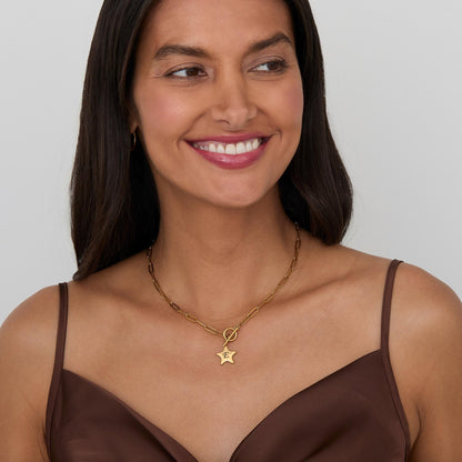 The Gold Star Necklace with Personalized Initial styled in Gold-Plated Steel — elegant everyday jewelry. Hypoallergenic, no.