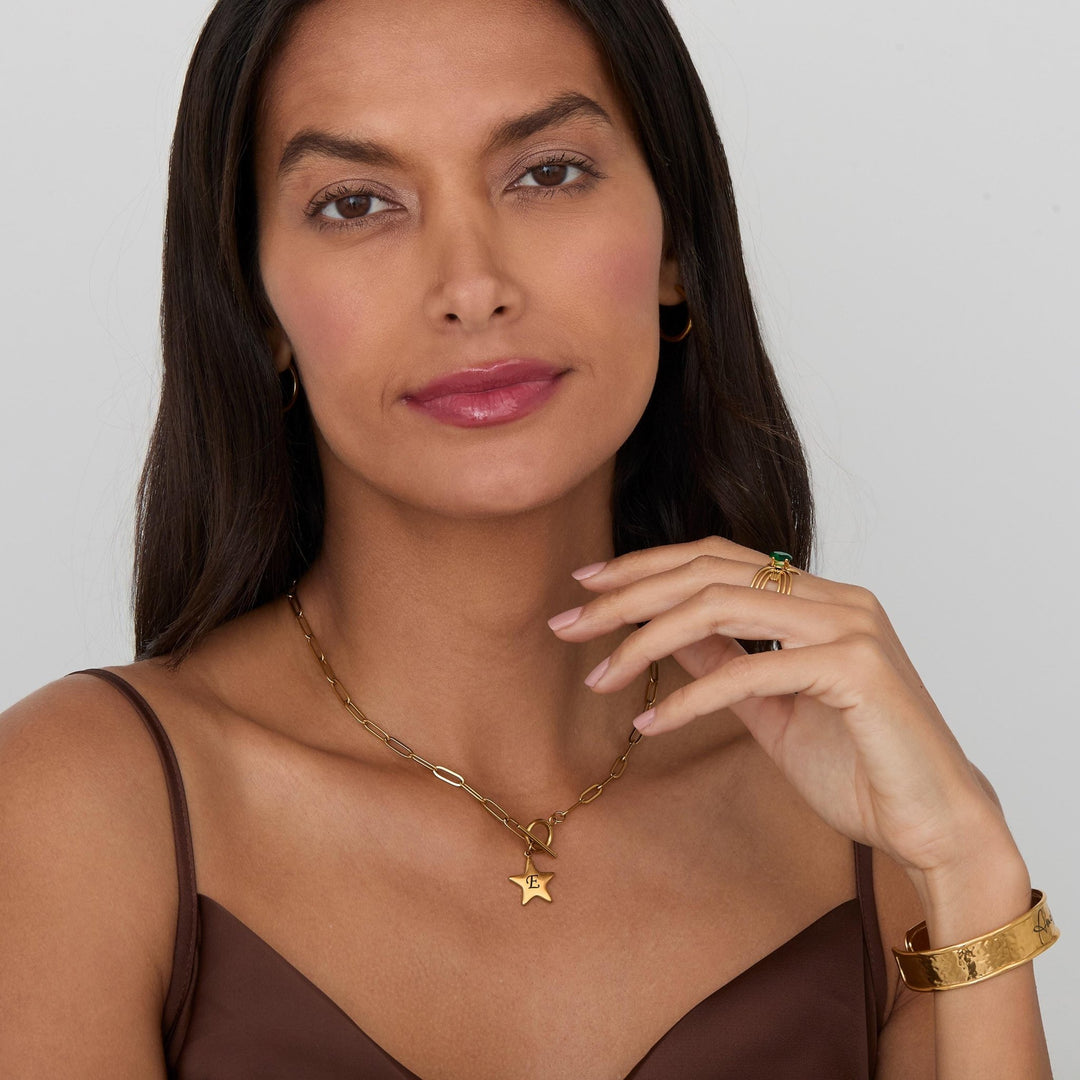 Gold Star Necklace Personalized worn in 18K Gold Vermeil — refined accessory. Tarnish-resistant.