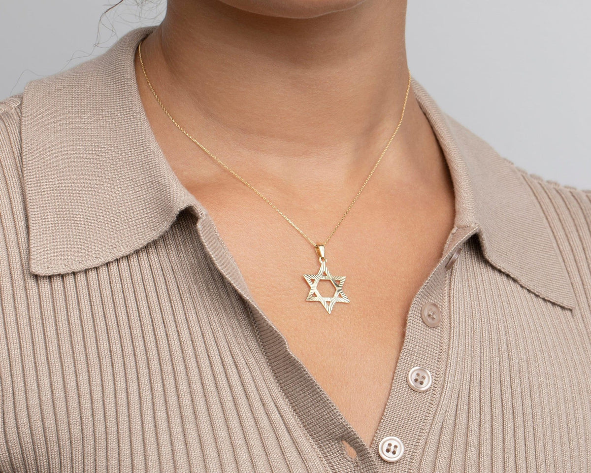 Macro detail of the Gold Star of David Necklace showcasing craftsmanship in 18K Gold Vermeil. Tarnish-resistant, handmade.