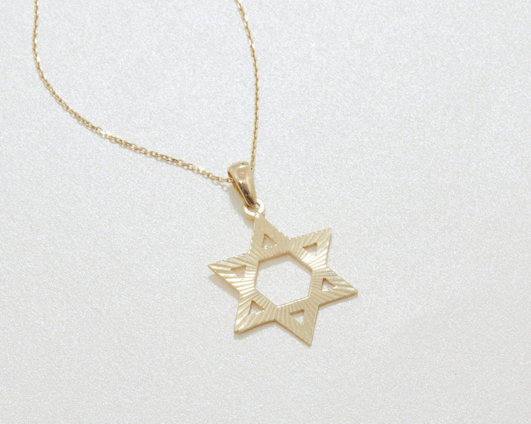 The Gold Star of David Necklace styled in 18K Gold Vermeil — elegant everyday jewelry. Hypoallergenic, no green marks.
