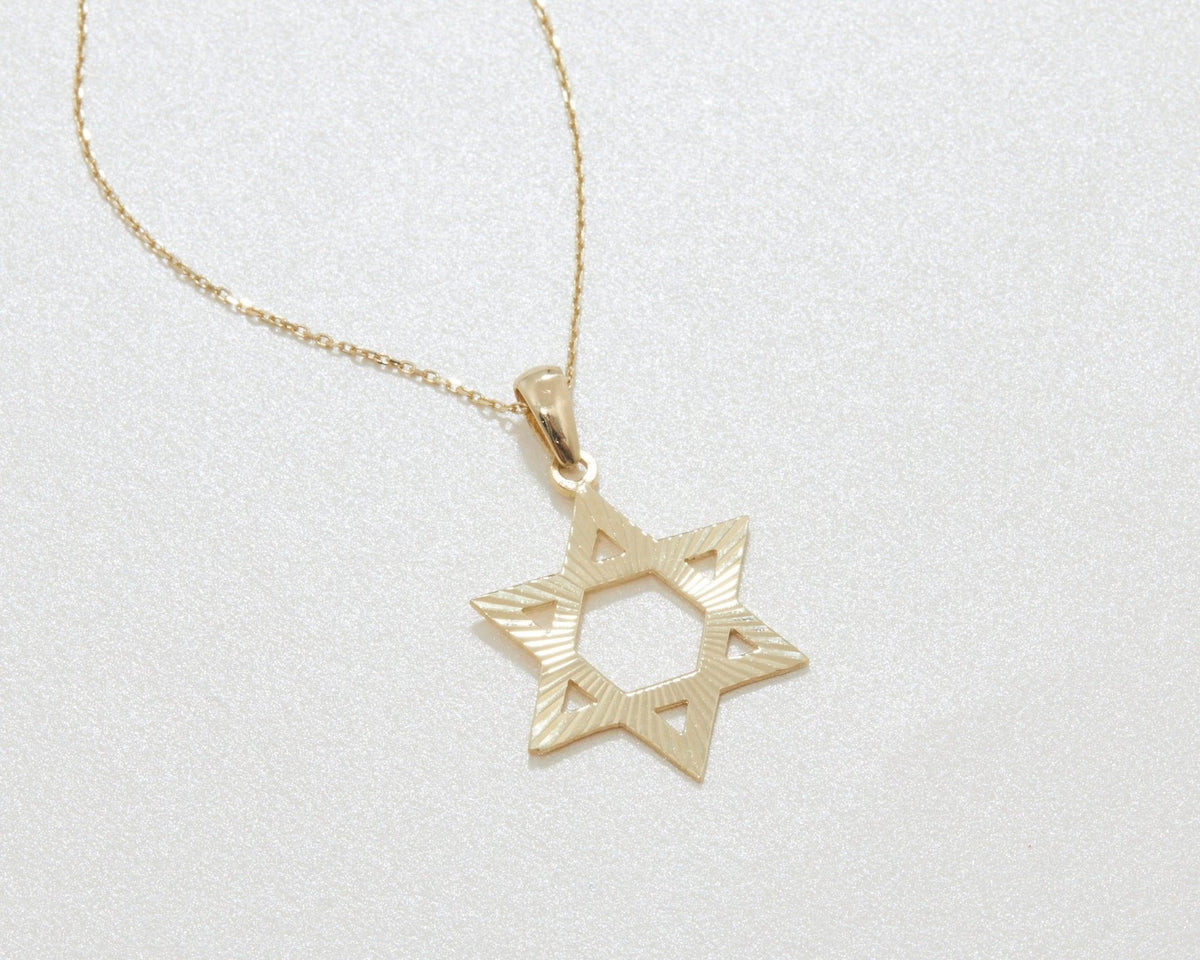 The Gold Star of David Necklace styled in 18K Gold Vermeil — elegant everyday jewelry. Hypoallergenic, no green marks.