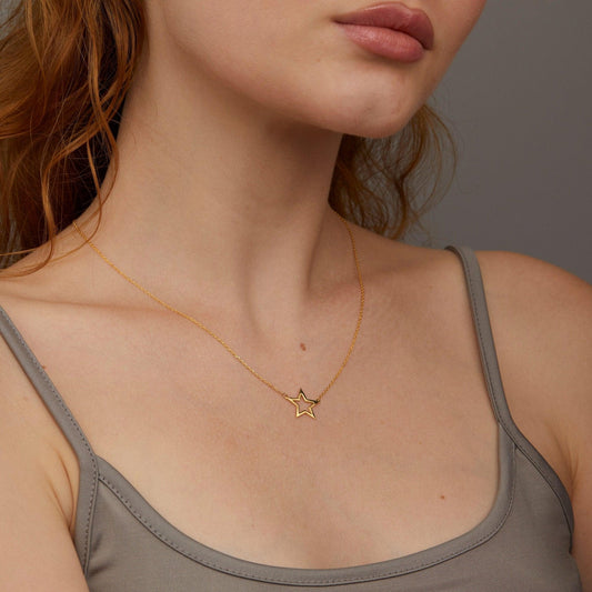 Close detail of the Gold Star Pendant Necklace in 18K Gold Vermeil. Hypoallergenic, no green marks, premium handmade jewelry.