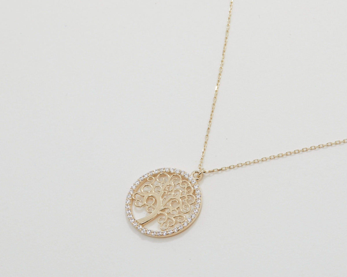 The Gold Tree of Life Necklace as a mother's day gift in 18K Gold Vermeil. Safe for sensitive skin, made for keeping.