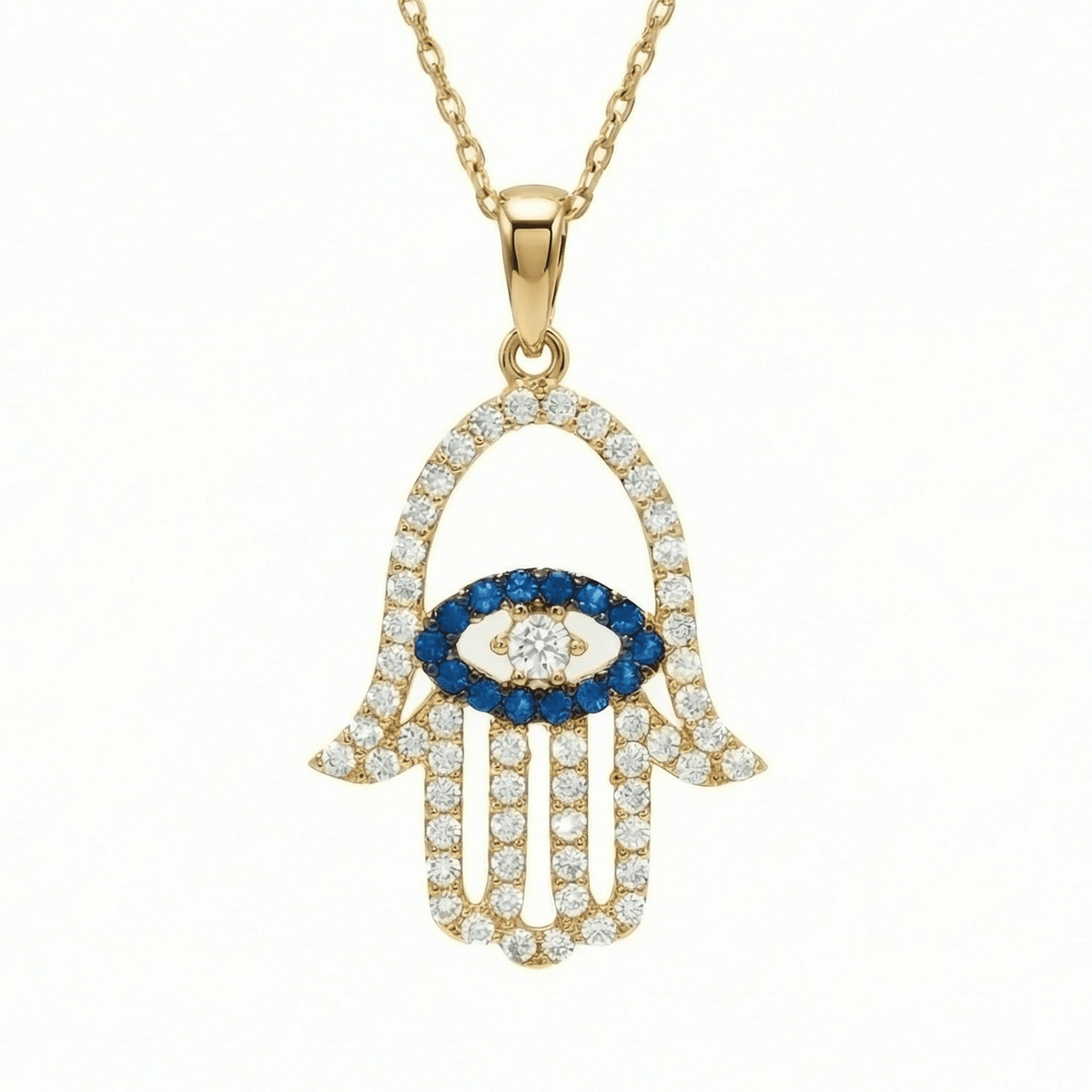 Hamsa Necklace in 14K Solid Gold: an open hamsa hand paved in clear CZ, with a blue CZ evil eye in the palm, on a fine chain.
