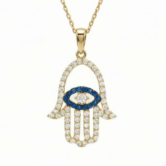 Hamsa Necklace in 14K Solid Gold: an open hamsa hand paved in clear CZ, with a blue CZ evil eye in the palm, on a fine chain.