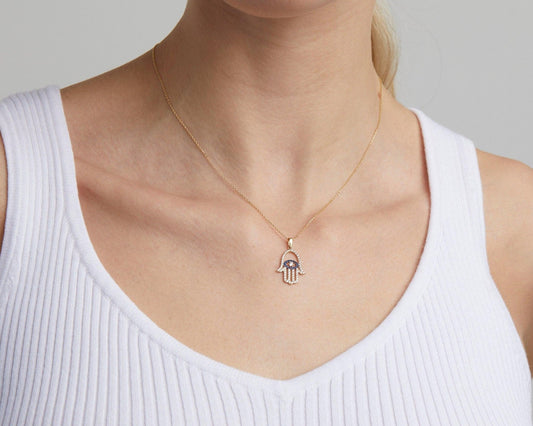 Close detail of the Hamsa Necklace in 18K Gold Vermeil. Safe for sensitive skin, premium handmade jewelry.
