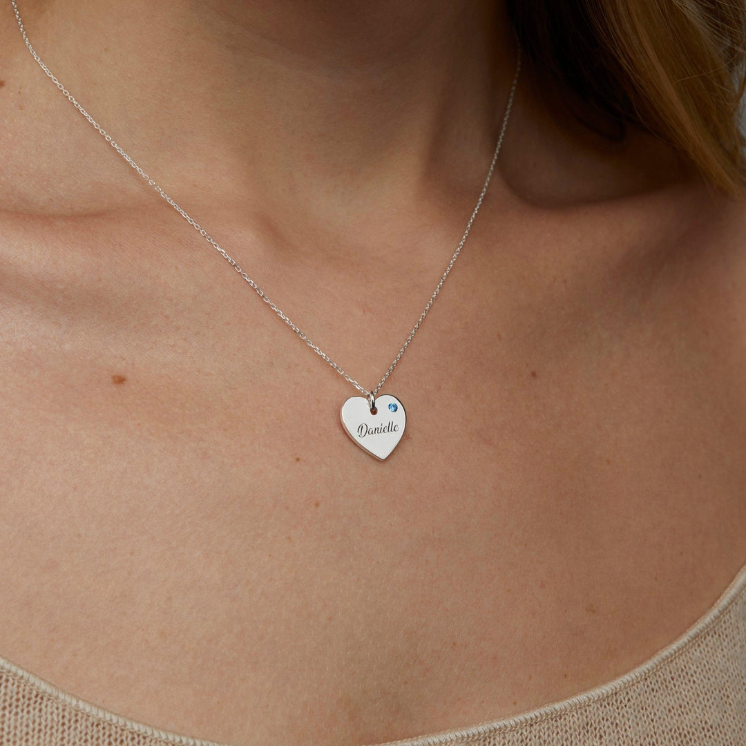 Macro detail of the Heart and Birthstone Name Necklace: Birthstone set in 18K Gold Vermeil. Tarnish-resistant, handmade.