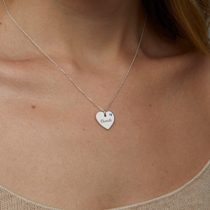 Macro detail of the Heart and Birthstone Name Necklace: Birthstone set in 18K Gold Vermeil. Tarnish-resistant, handmade.