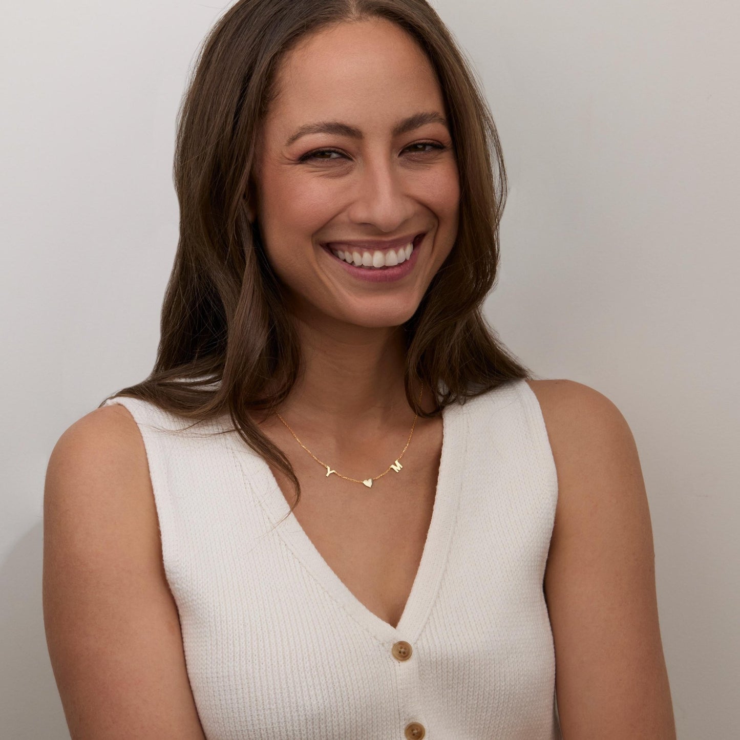 The Heart and Initial Necklace styled in 18K Gold Vermeil — elegant everyday jewelry. Hypoallergenic, no green marks.