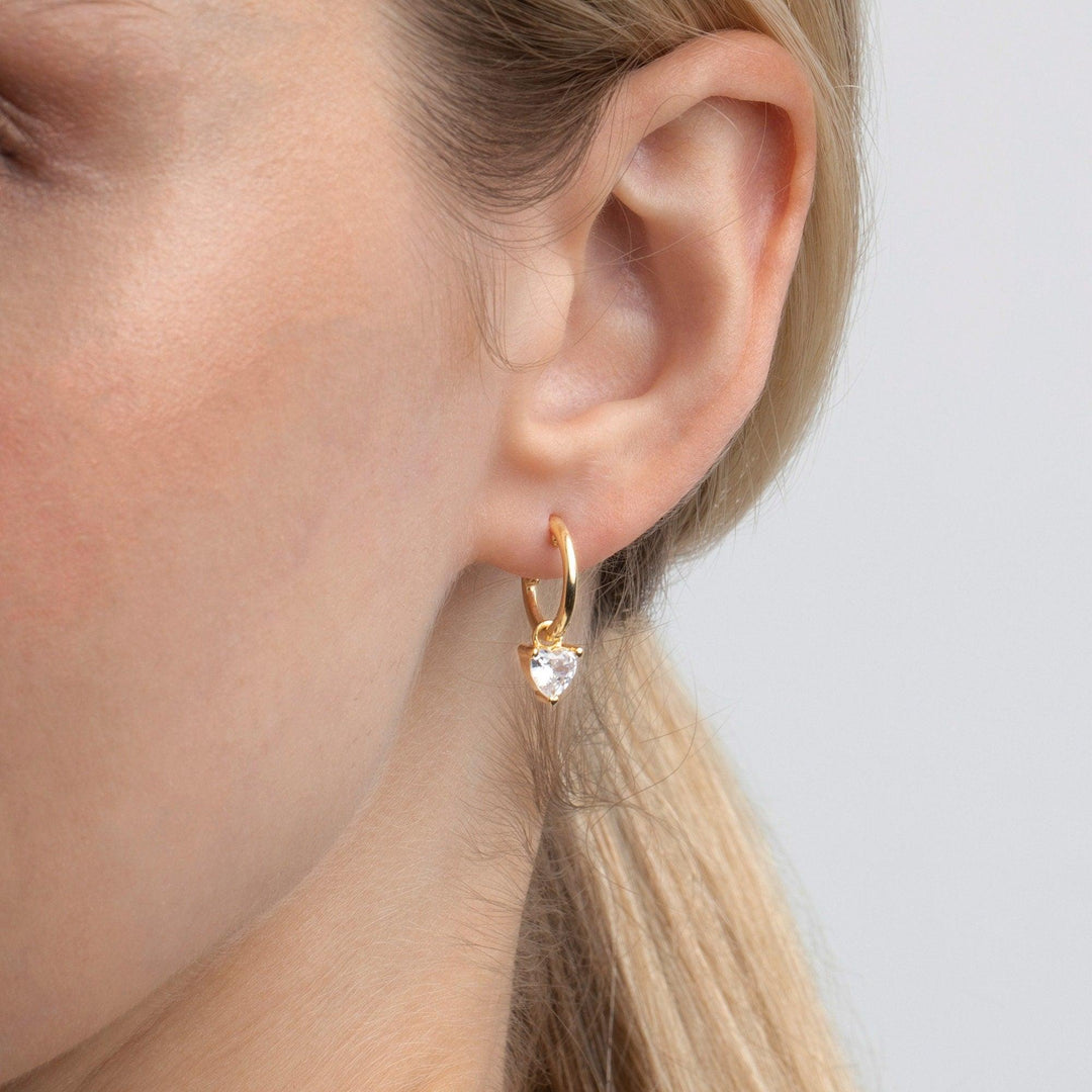 The Heart Diamond Earring styled in 18K Gold Vermeil — elegant everyday jewelry. Hypoallergenic for sensitive ears.