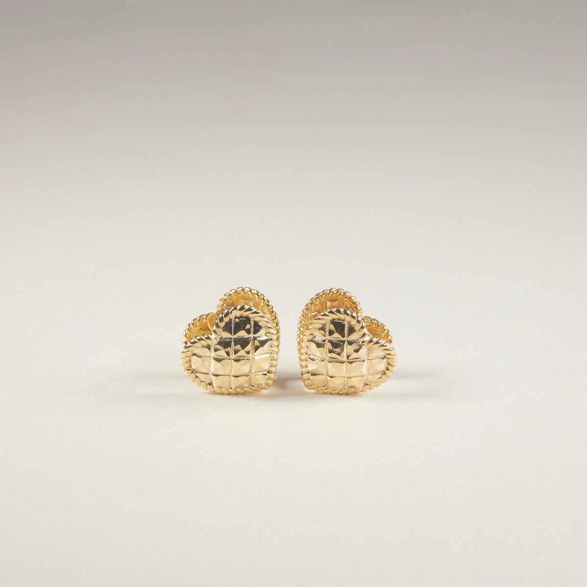 Macro detail of the Heart Earring showcasing craftsmanship in 18K Gold Vermeil. No green marks, handmade.