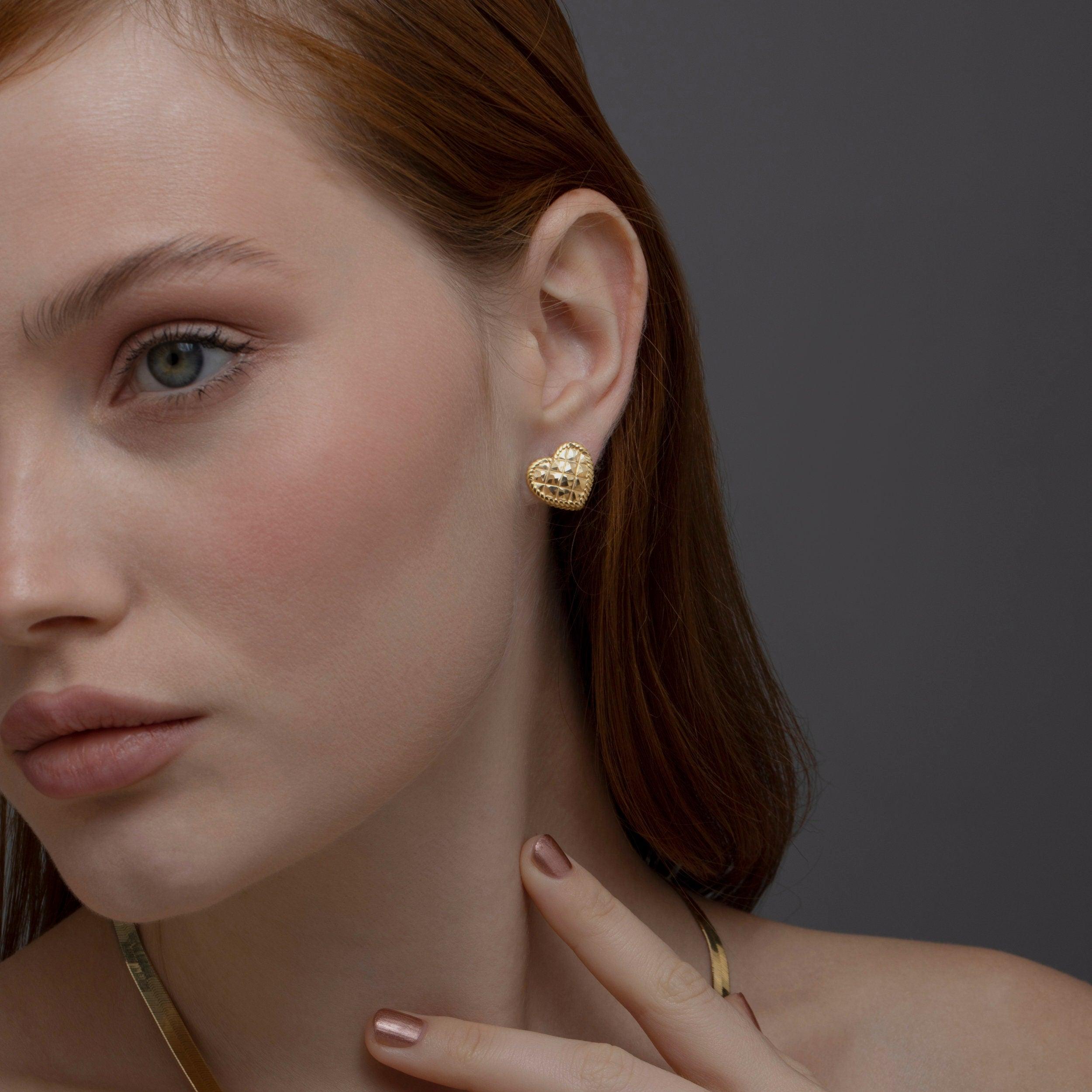 The Heart Earring worn in 18K Gold Vermeil — refined accessory for women. Tarnish-resistant.