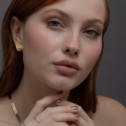 The Heart Earring styled in 18K Gold Vermeil — elegant everyday jewelry. Hypoallergenic for sensitive ears.
