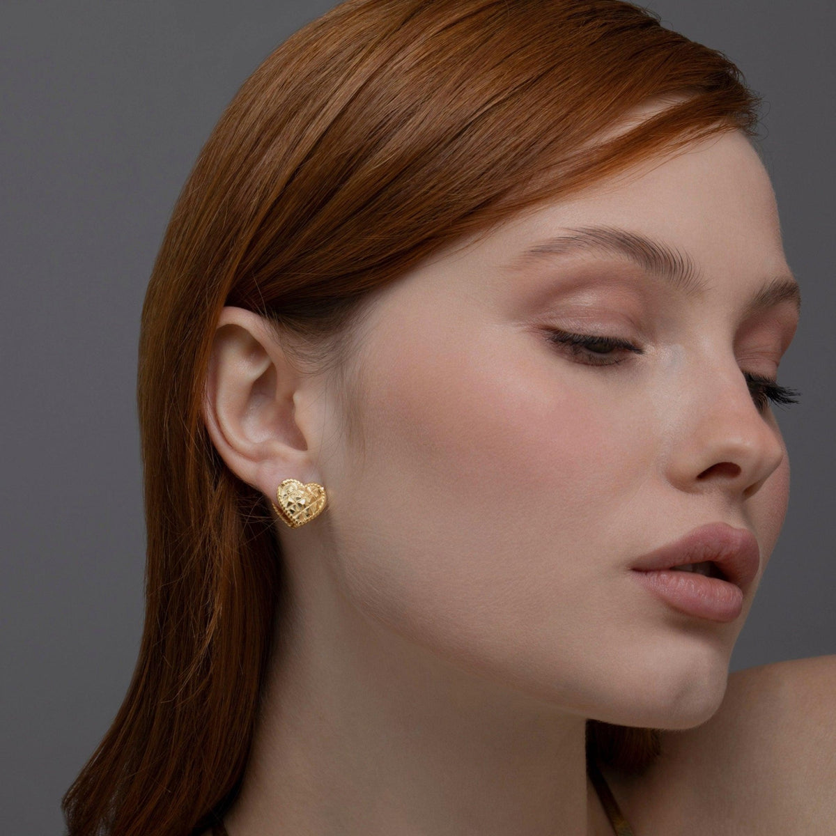 Heart Earring styled with complementary pieces in 18K Gold Vermeil. Hypoallergenic for sensitive ears, layered looks.