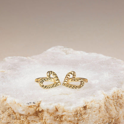 Macro detail of the Heart Hoop Earrings showcasing craftsmanship in 18K Gold Vermeil. No green marks, handmade.