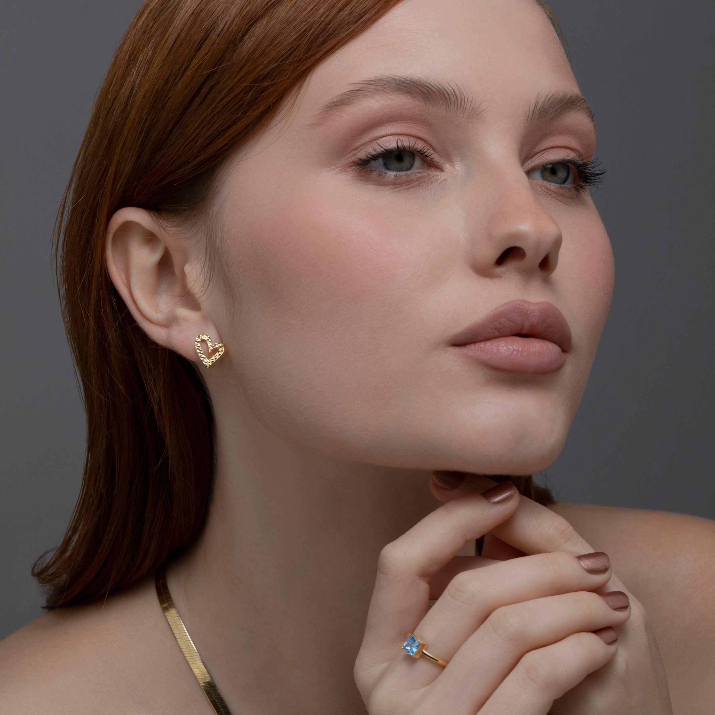 The Heart Hoop Earrings worn in 18K Gold Vermeil — refined accessory for women. Tarnish-resistant.