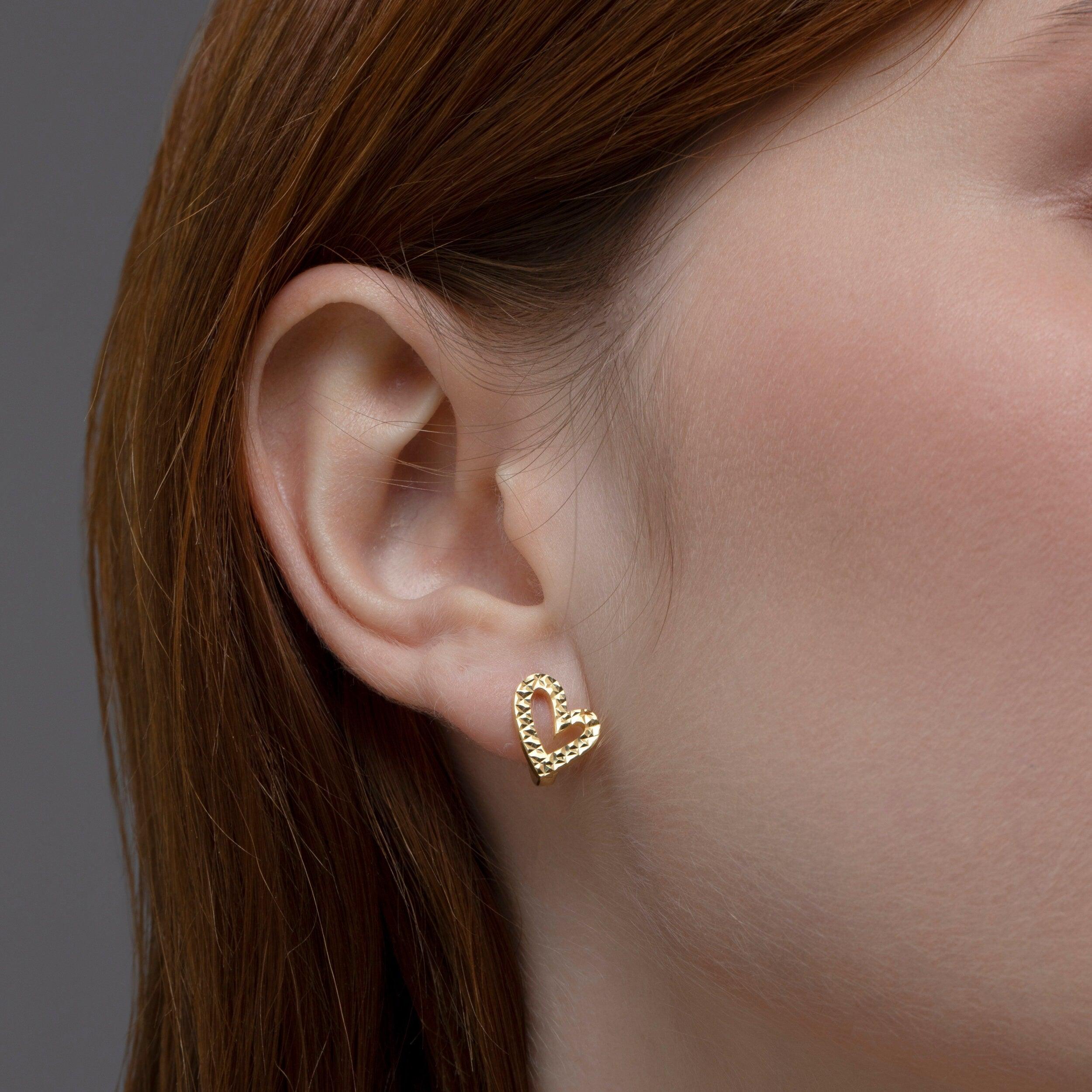 The Heart Hoop Earrings styled in 18K Gold Vermeil — elegant everyday jewelry. Hypoallergenic for sensitive ears.