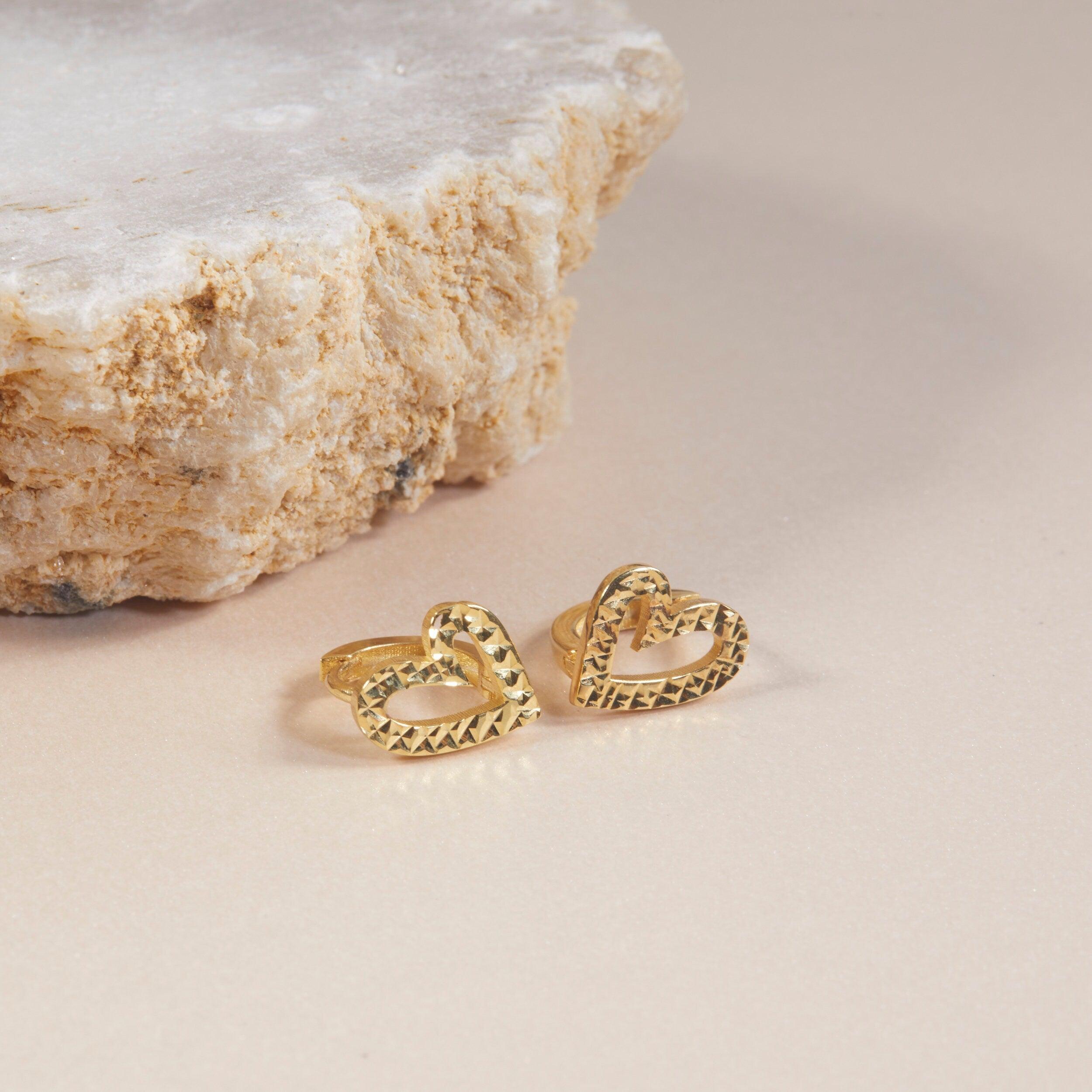 Heart Hoop Earrings styled with complementary pieces in 18K Gold Vermeil. Hypoallergenic for sensitive ears, layered looks.