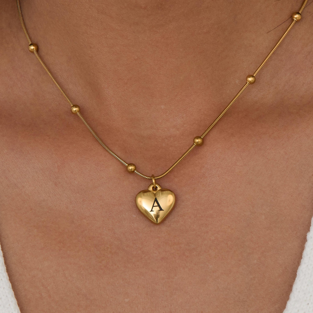 Heart Initial Engraved Necklace as a thoughtful birthday gift in Gold-Plated Steel. Hypoallergenic, no green marks.