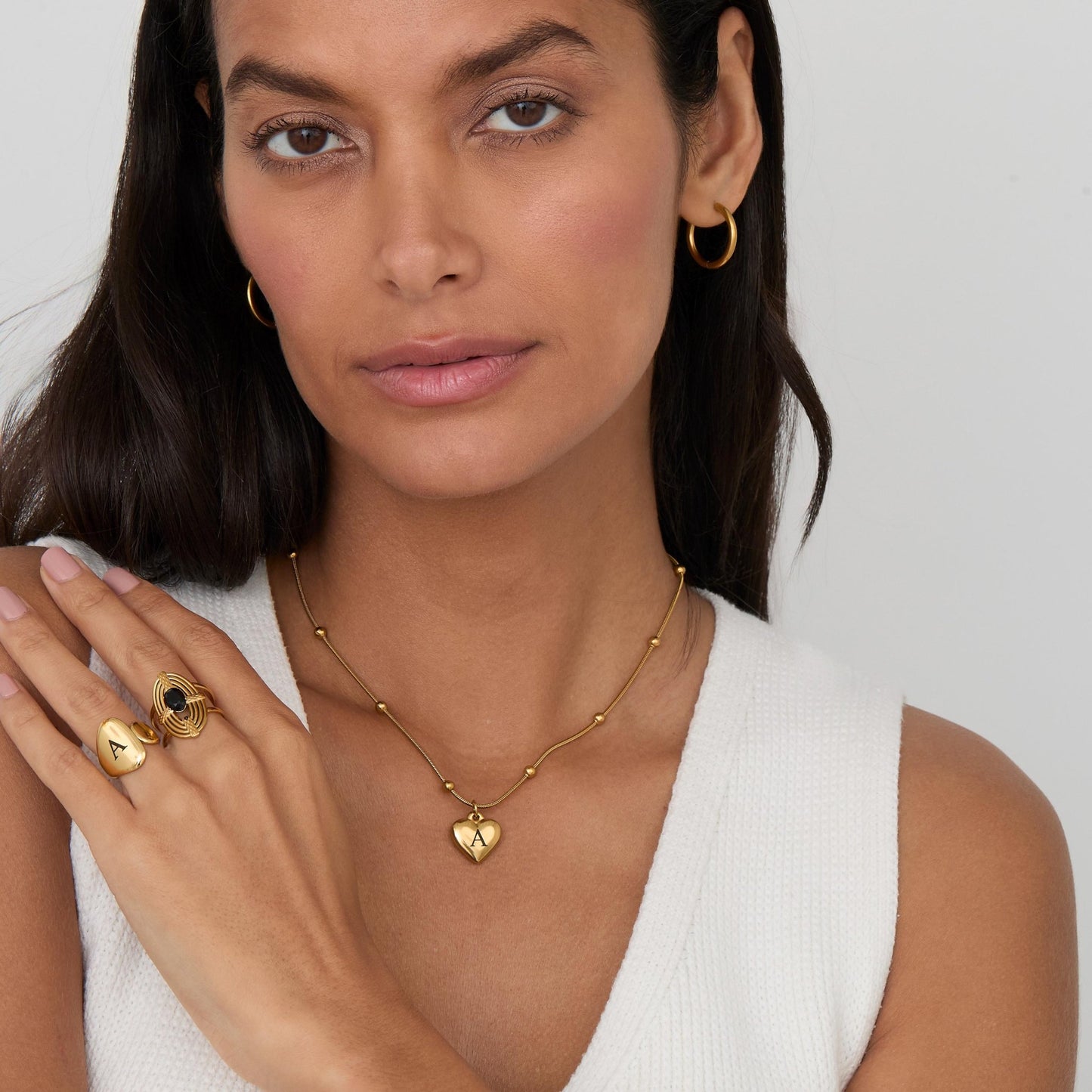 The Heart Initial Engraved Necklace as a mother's day gift in Gold-Plated Steel. Safe for sensitive skin, made for keeping.