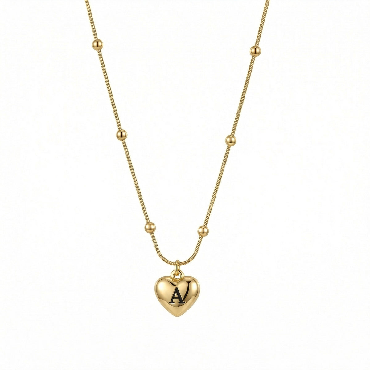 Heart Initial Engraved Necklace in Gold-Plated Steel. Tarnish-resistant, perfect for daily wear.