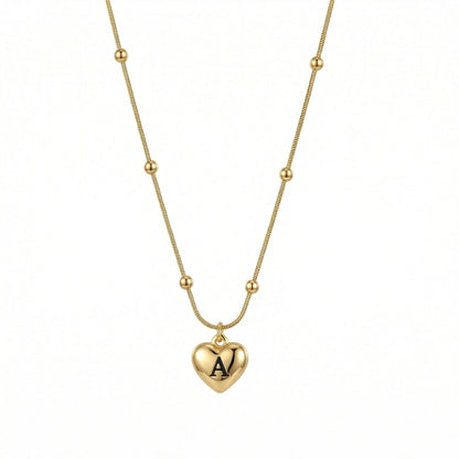 Heart Initial Engraved Necklace in Gold-Plated Steel. Tarnish-resistant, perfect for daily wear.