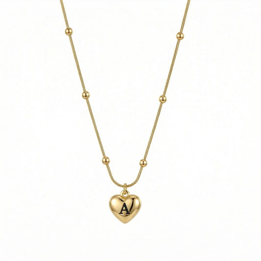 Heart Initial Engraved Necklace in Gold-Plated Steel. Tarnish-resistant, perfect for daily wear.