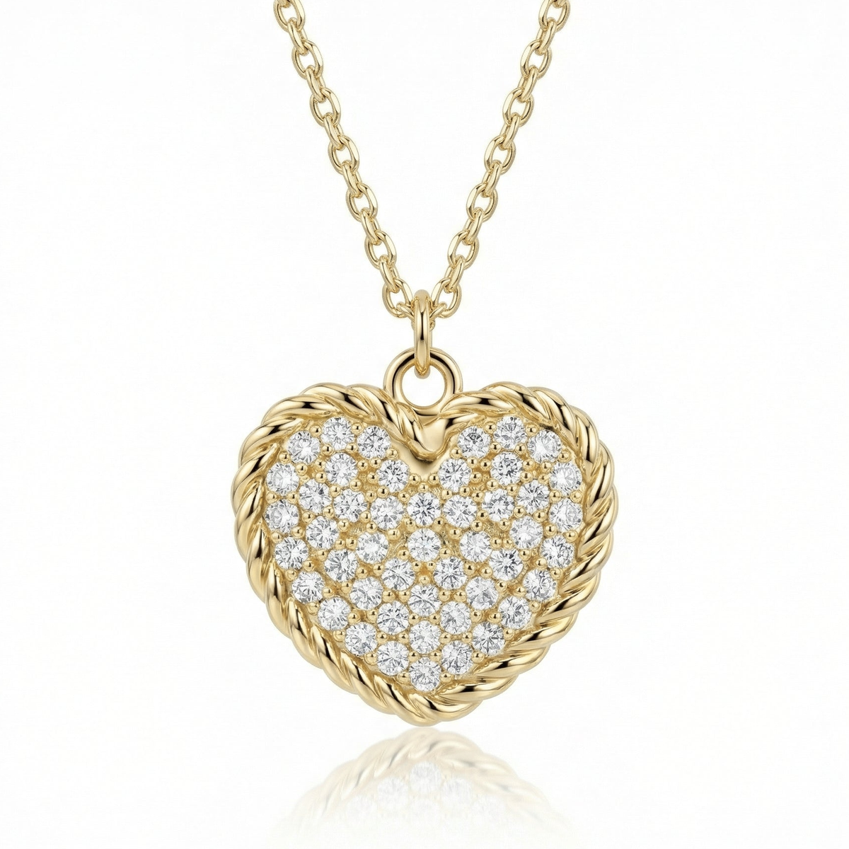 Heart necklace in 14K solid gold, the heart paved in small clear CZ stones inside a twisted rope border.