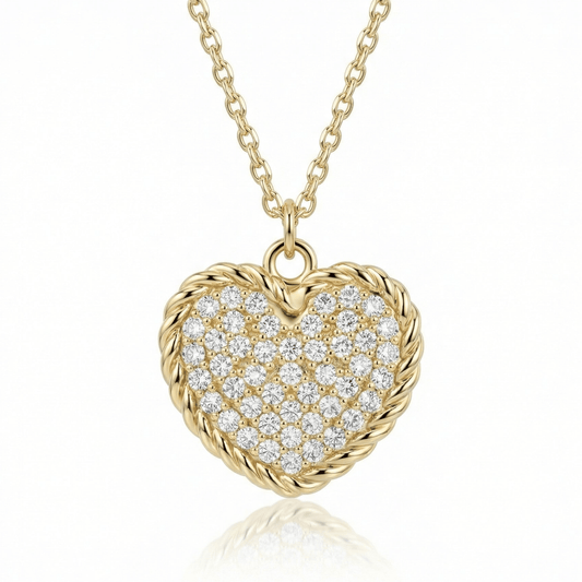 Heart necklace in 14K solid gold, the heart paved in small clear CZ stones inside a twisted rope border.