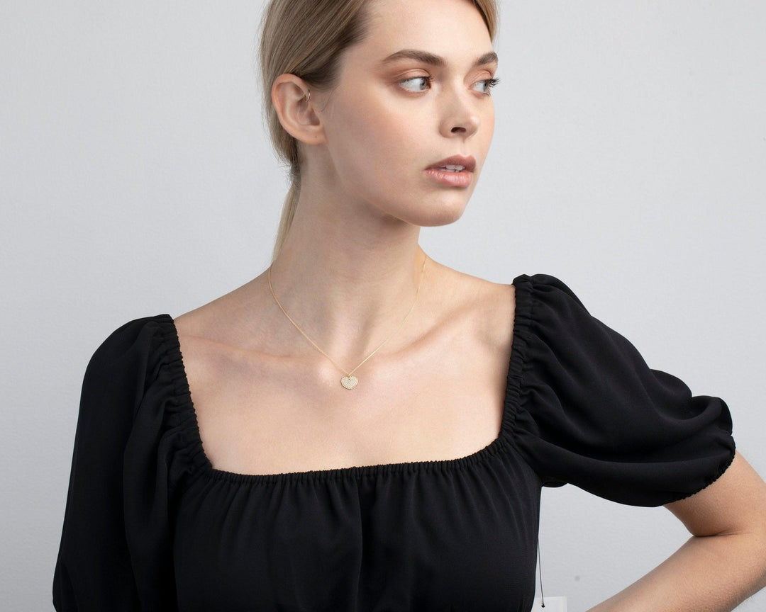 The Heart Necklace styled in 18K Gold Vermeil — elegant everyday jewelry. Hypoallergenic, no green marks.