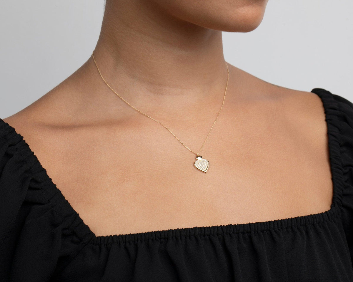 The Heart Necklace with CZ Diamond worn in 18K Gold Vermeil — refined accessory for women. Safe for sensitive skin.