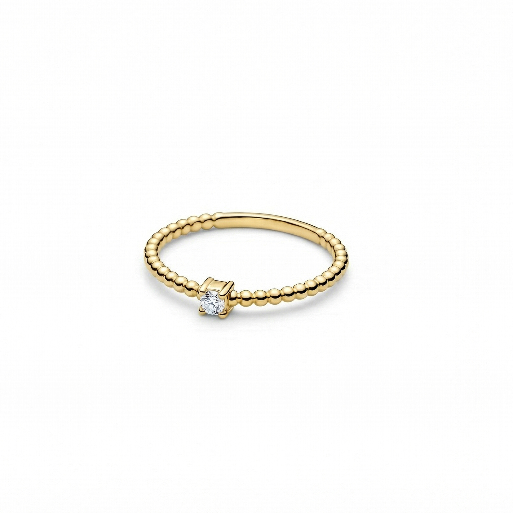 Gold ring with a small diamond on a white background