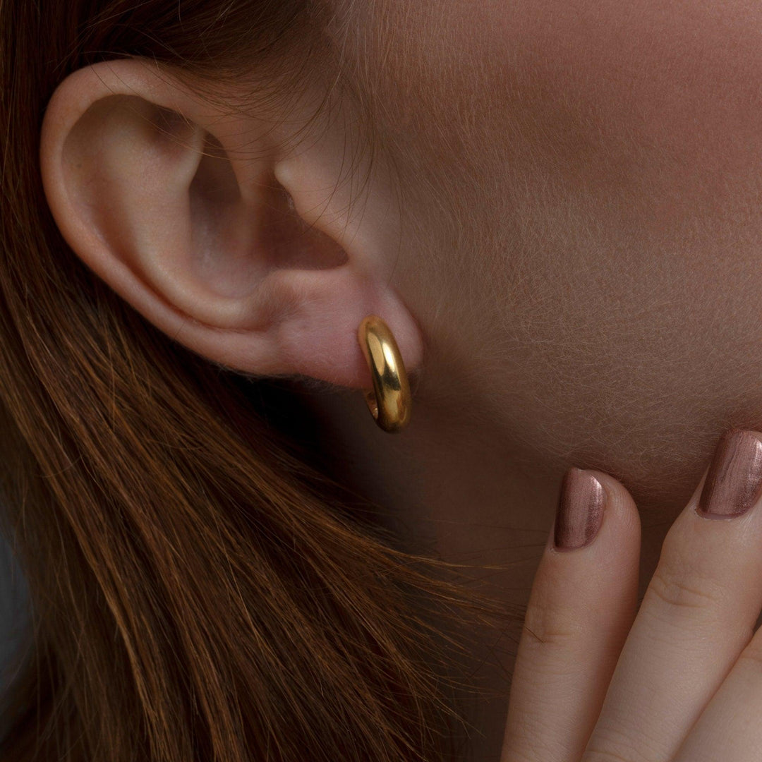 Huggie Hoops Hinged Earrings as a thoughtful birthday gift in 18K Gold Vermeil. Hypoallergenic for sensitive ears.
