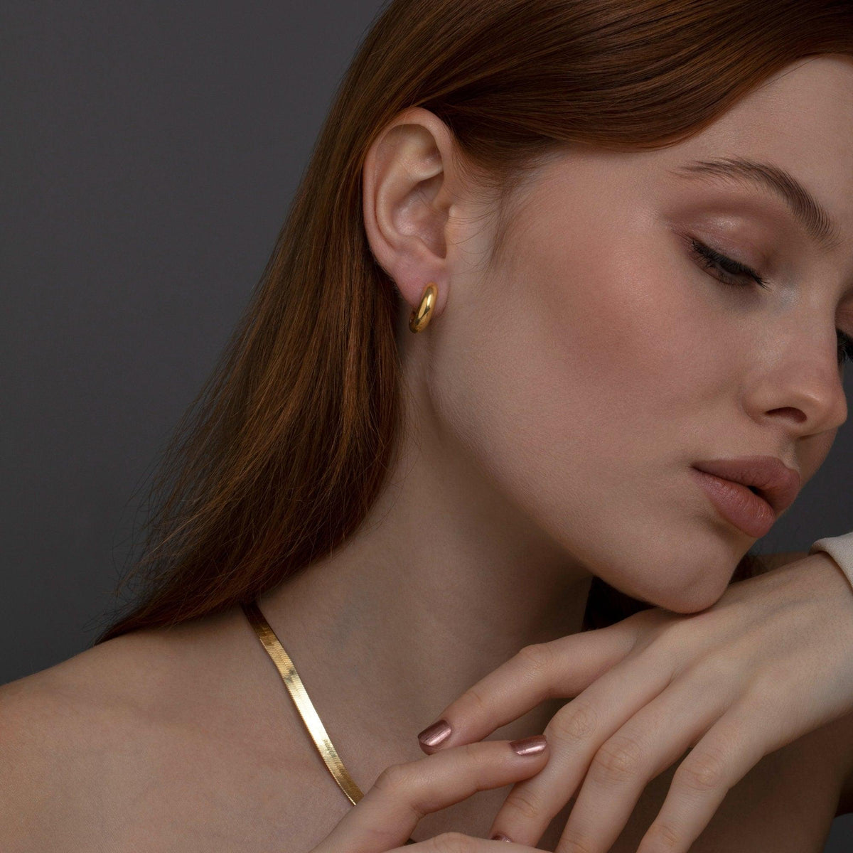 The Huggie Hoops Hinged Earrings as an anniversary gift in 18K Gold Vermeil. Tarnish-resistant, made for keeping.