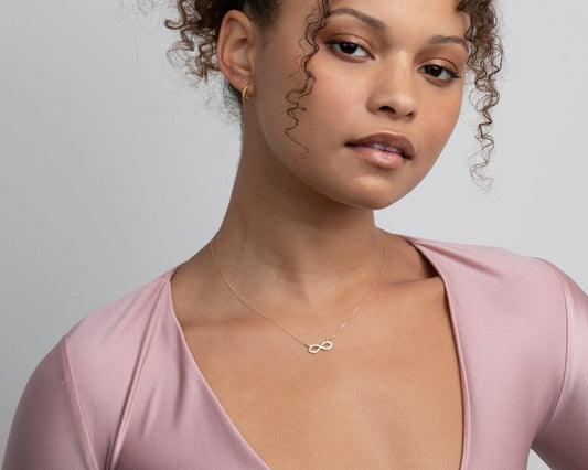 Close detail of the Infinity Necklace in 18K Gold Vermeil. Safe for sensitive skin, premium handmade jewelry.