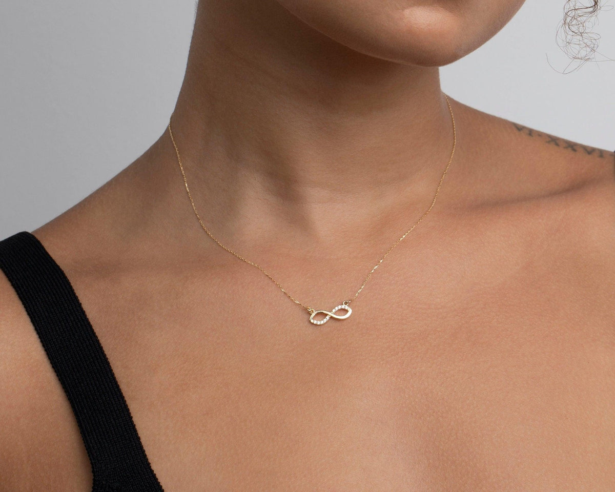 The Infinity Necklace styled in 18K Gold Vermeil — elegant everyday jewelry. Hypoallergenic, no green marks.