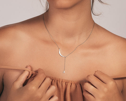 Close detail of the Initial Moon Necklace in 18K Gold Vermeil. Safe for sensitive skin, premium handmade jewelry.