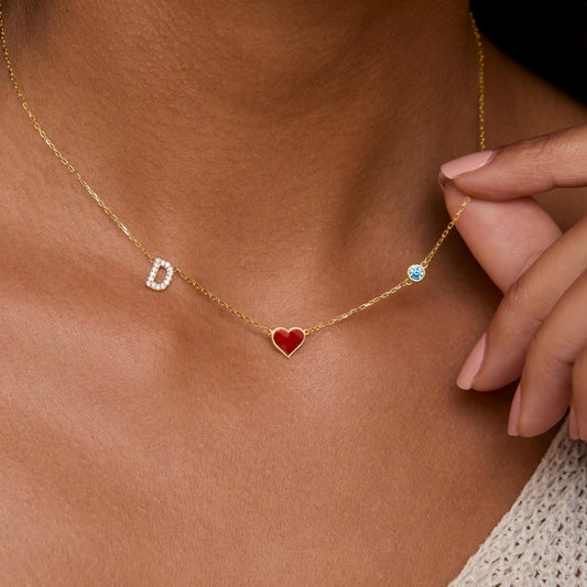 Close detail of the Initial Necklace with Heart Charm + Birthstone in 18K Gold Vermeil with Birthstone. Safe for sensitive.