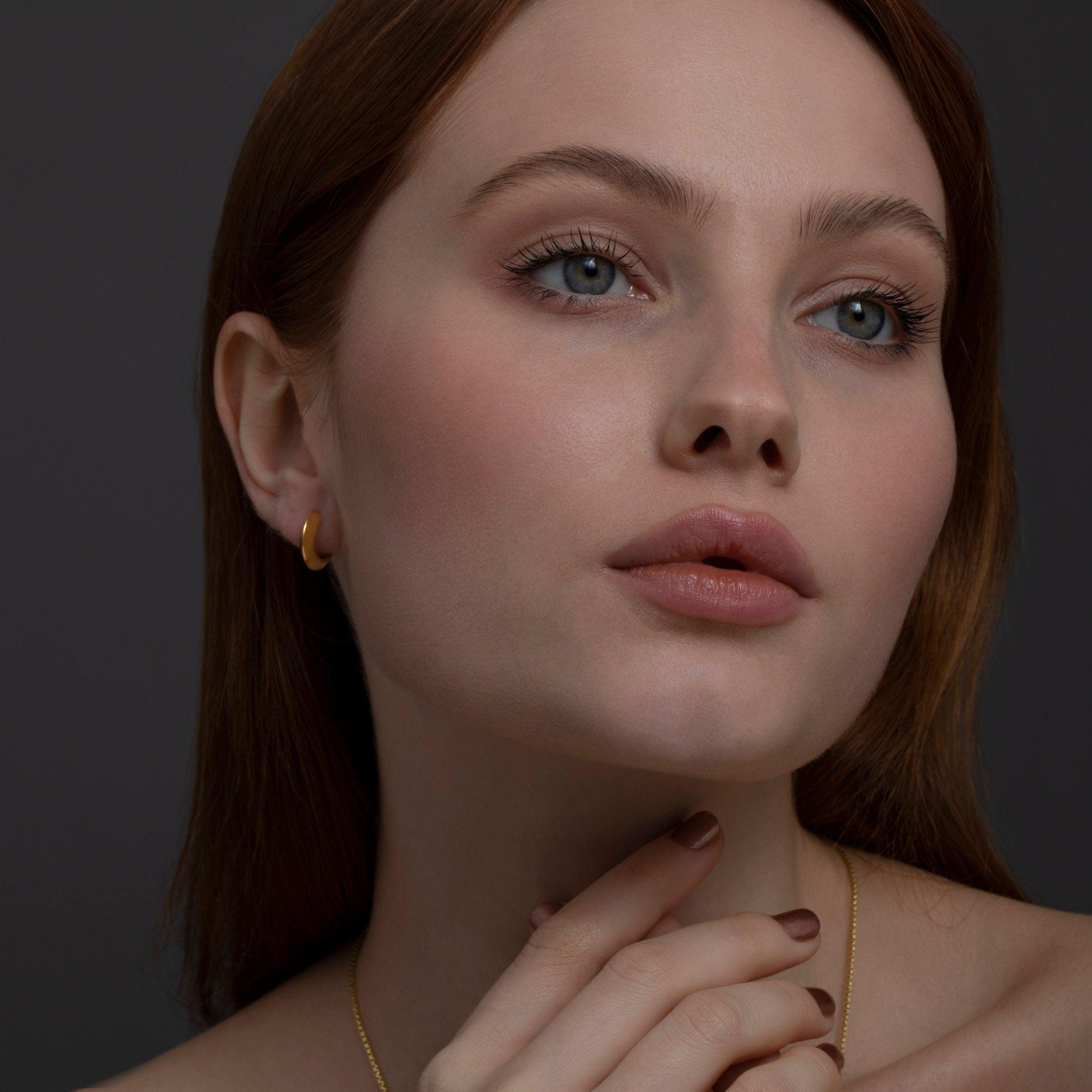 Knife Edge Huggie Hoop Earring as a thoughtful birthday gift in 18K Gold Vermeil. Hypoallergenic for sensitive ears.