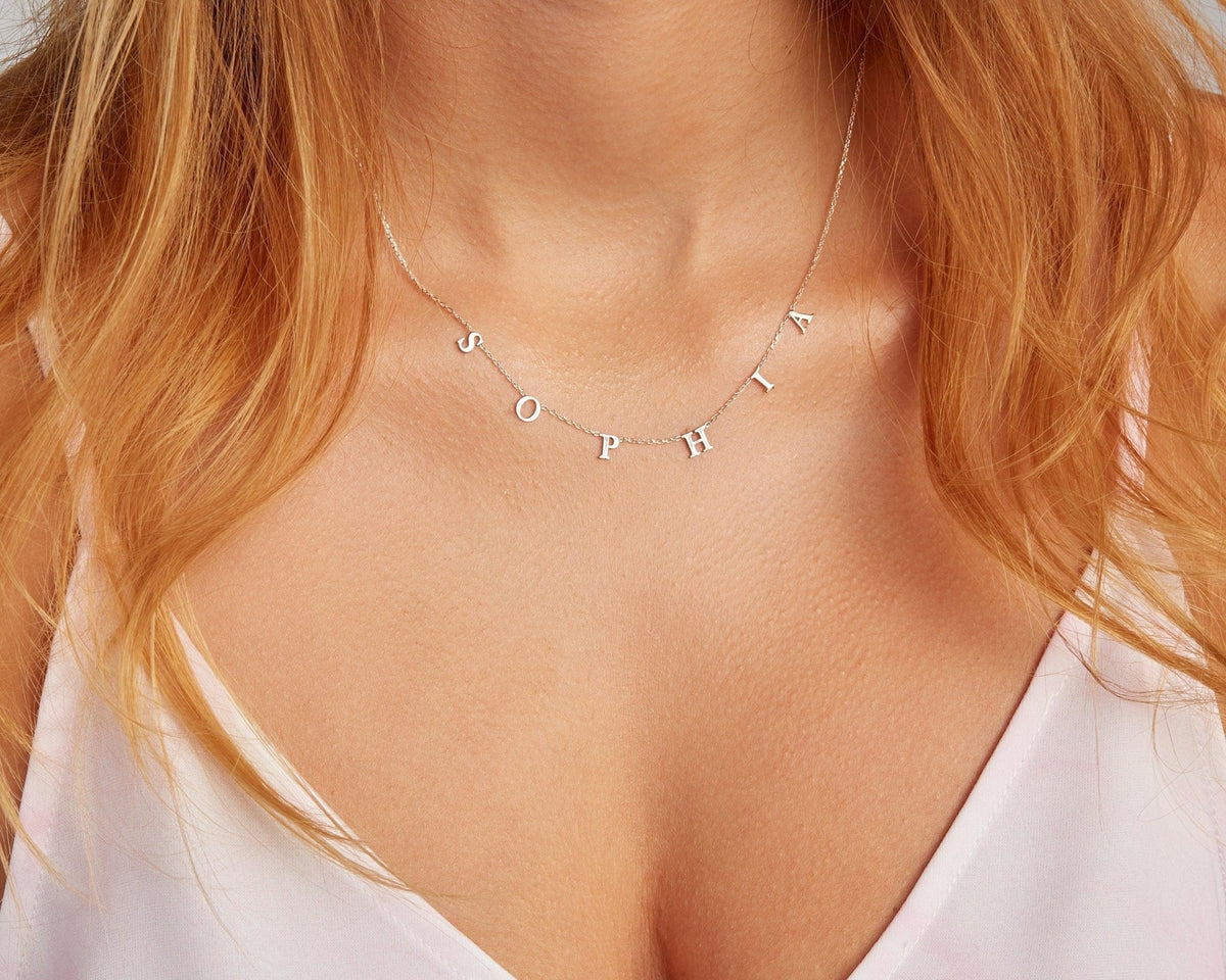 Letter Name Necklace as a thoughtful birthday gift in 18K Gold Vermeil. Hypoallergenic, no green marks.