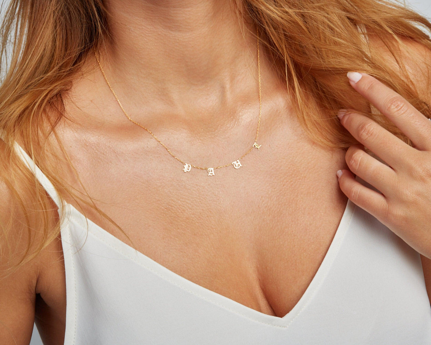 The Letter Name Necklace styled in 18K Gold Vermeil — elegant everyday jewelry. Hypoallergenic, no green marks.