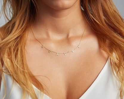The Letter Name Necklace worn in 18K Gold Vermeil — refined accessory for women. Safe for sensitive skin.