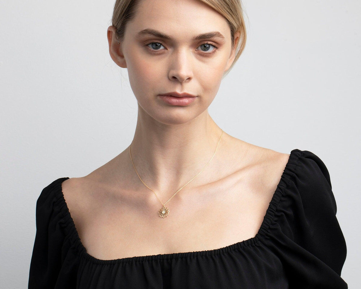The Lotus Flower Necklace as a daily wear gift in 18K Gold Vermeil. Safe for sensitive skin, made for keeping.