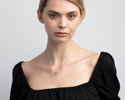 The Lotus Flower Necklace as a daily wear gift in 18K Gold Vermeil. Safe for sensitive skin, made for keeping.