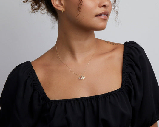 Close detail of the Lotus Necklace in 18K Gold Vermeil. Safe for sensitive skin, premium handmade jewelry.