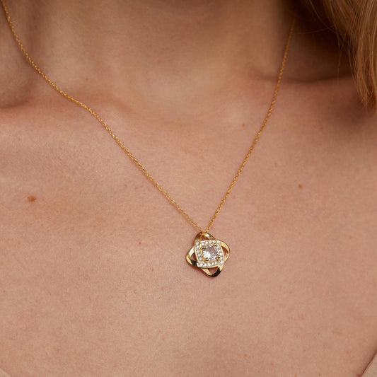Close detail of the Love Knot Necklace in 18K Gold Vermeil. Hypoallergenic, no green marks, premium handmade jewelry.