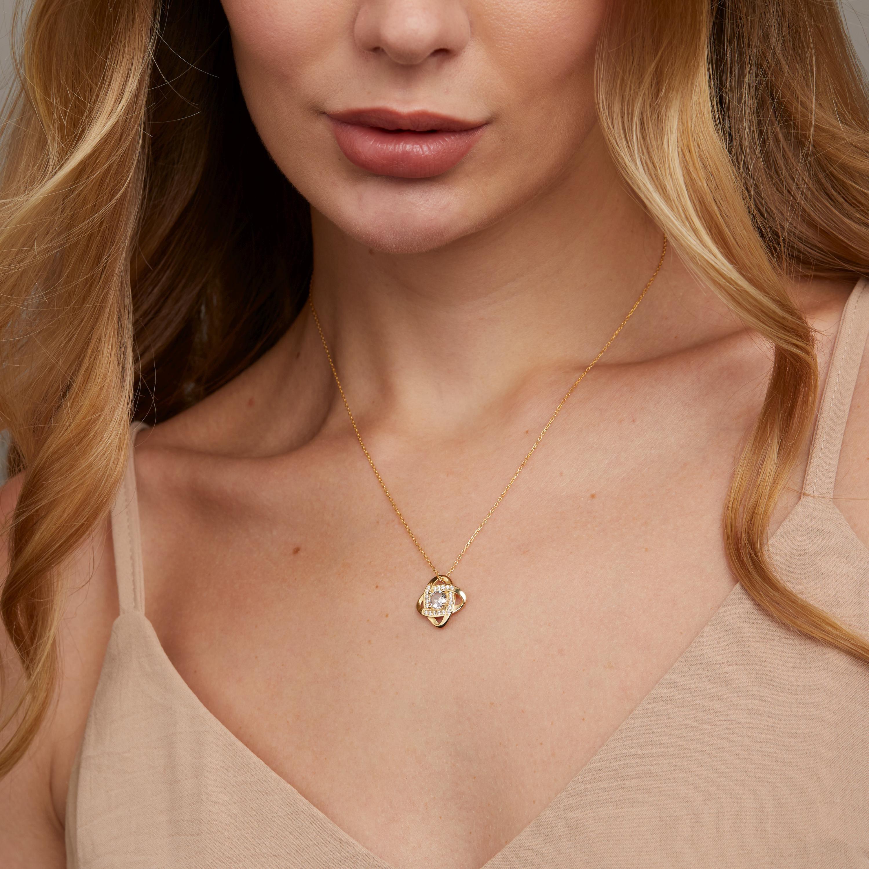 Macro detail of the Love Knot Necklace showcasing craftsmanship in 18K Gold Vermeil. Tarnish-resistant, handmade.